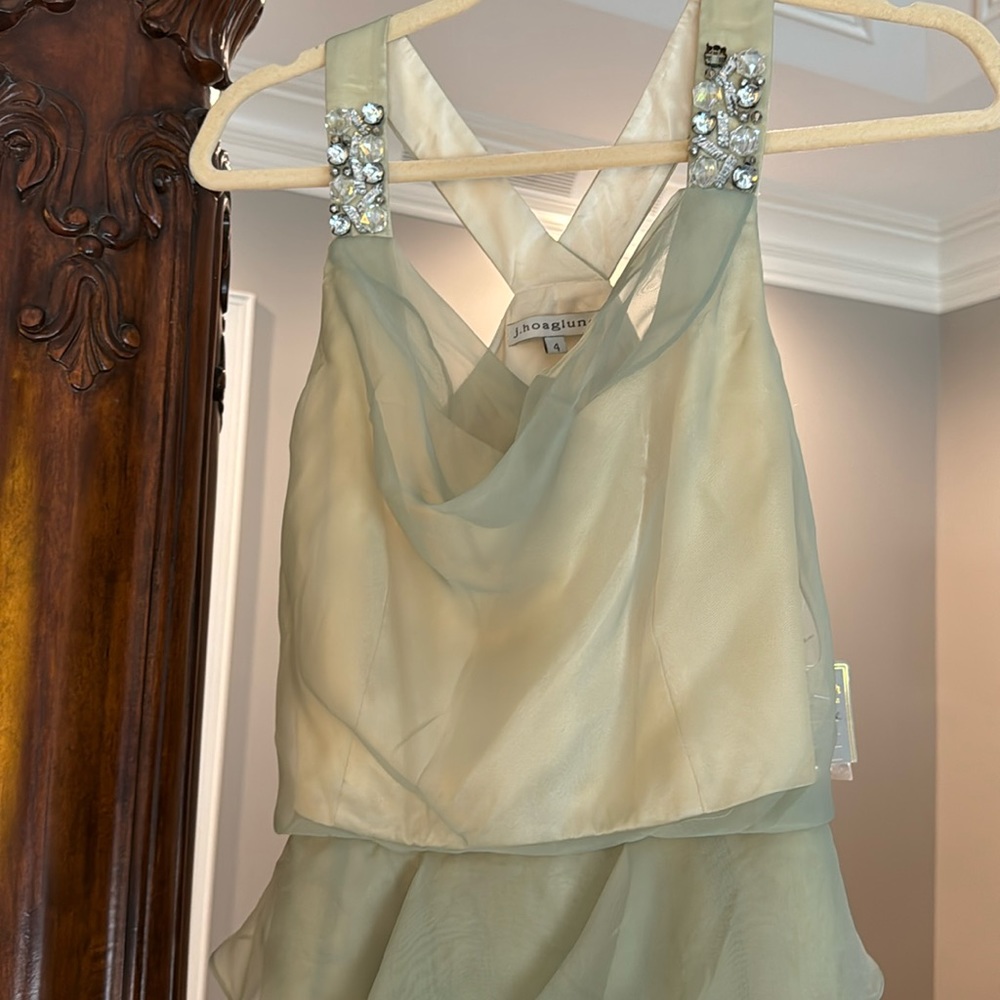 Light green cocktail dress with rhinestone embellishments